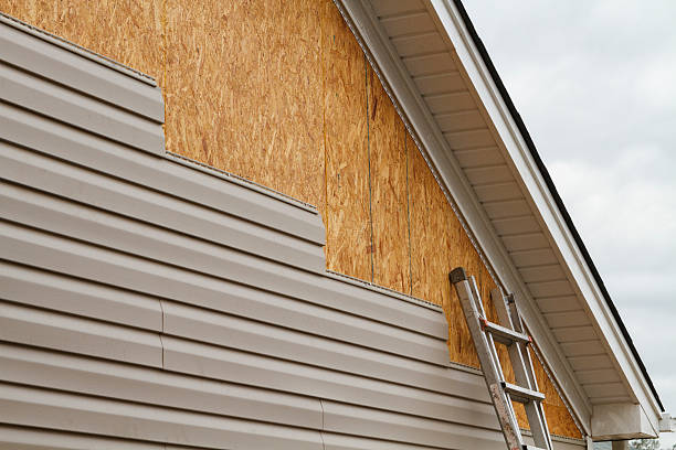 Professional Siding Replacement technician working in Centre Hall, PA